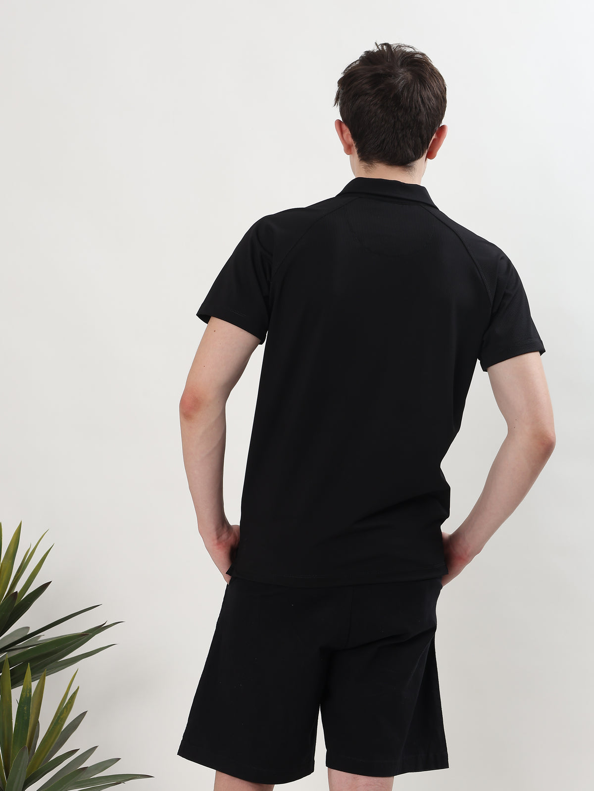 MEN BLACK TEXTURED HALF-ZIP POLO T-SHIRT