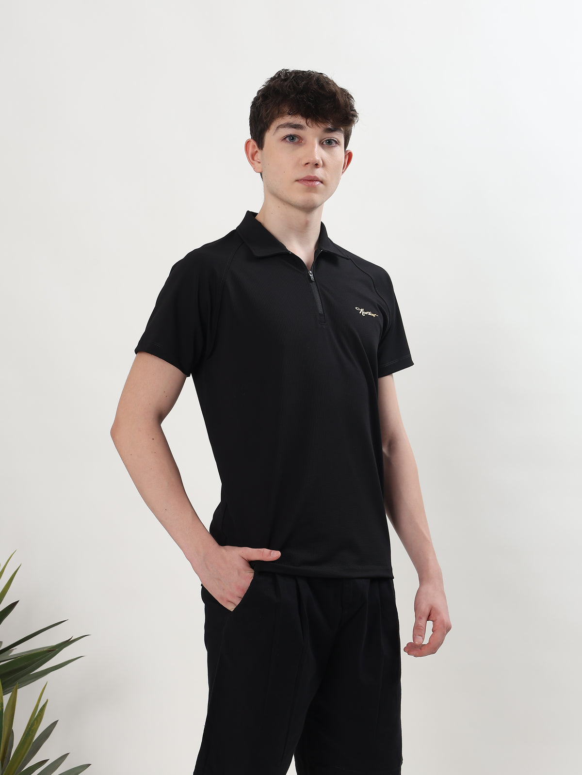 MEN BLACK TEXTURED HALF-ZIP POLO T-SHIRT