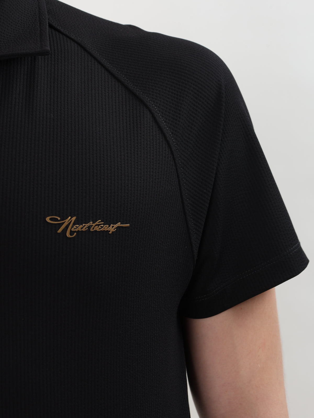 MEN BLACK TEXTURED HALF-ZIP POLO T-SHIRT