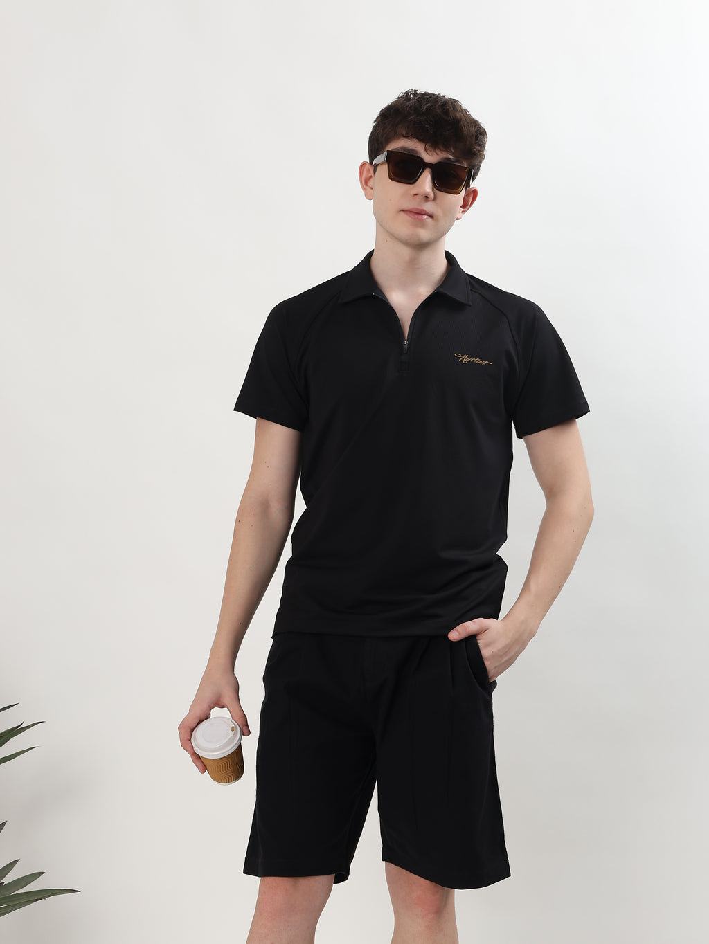 MEN BLACK TEXTURED HALF-ZIP POLO T-SHIRT