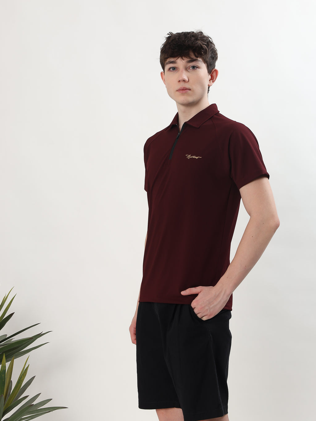 MEN MAROON TEXTURED HALF-ZIP POLO T-SHIRT